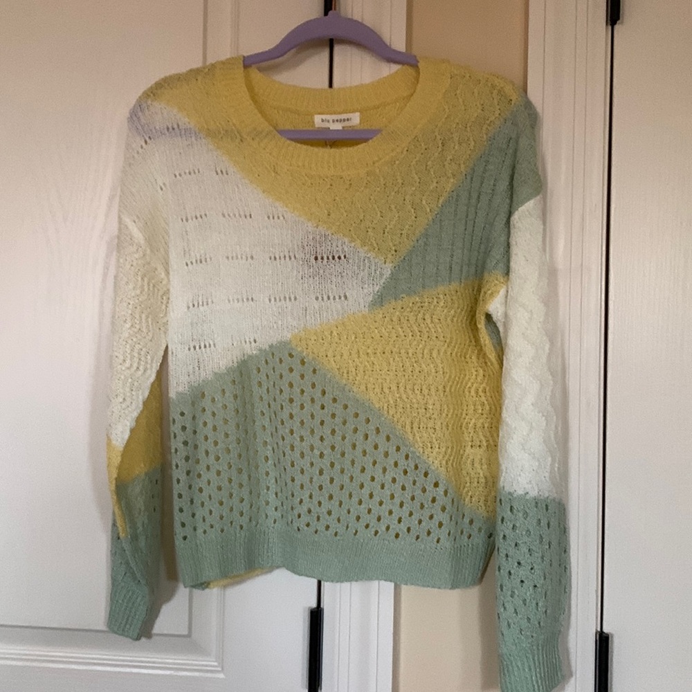 Lightweight sweater perfect for that in between weather!